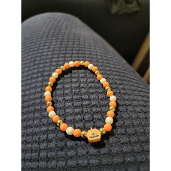 Handmade Orange and White Halloween Stretch Bracelet with Pumpkin - Picture 9 of 11
